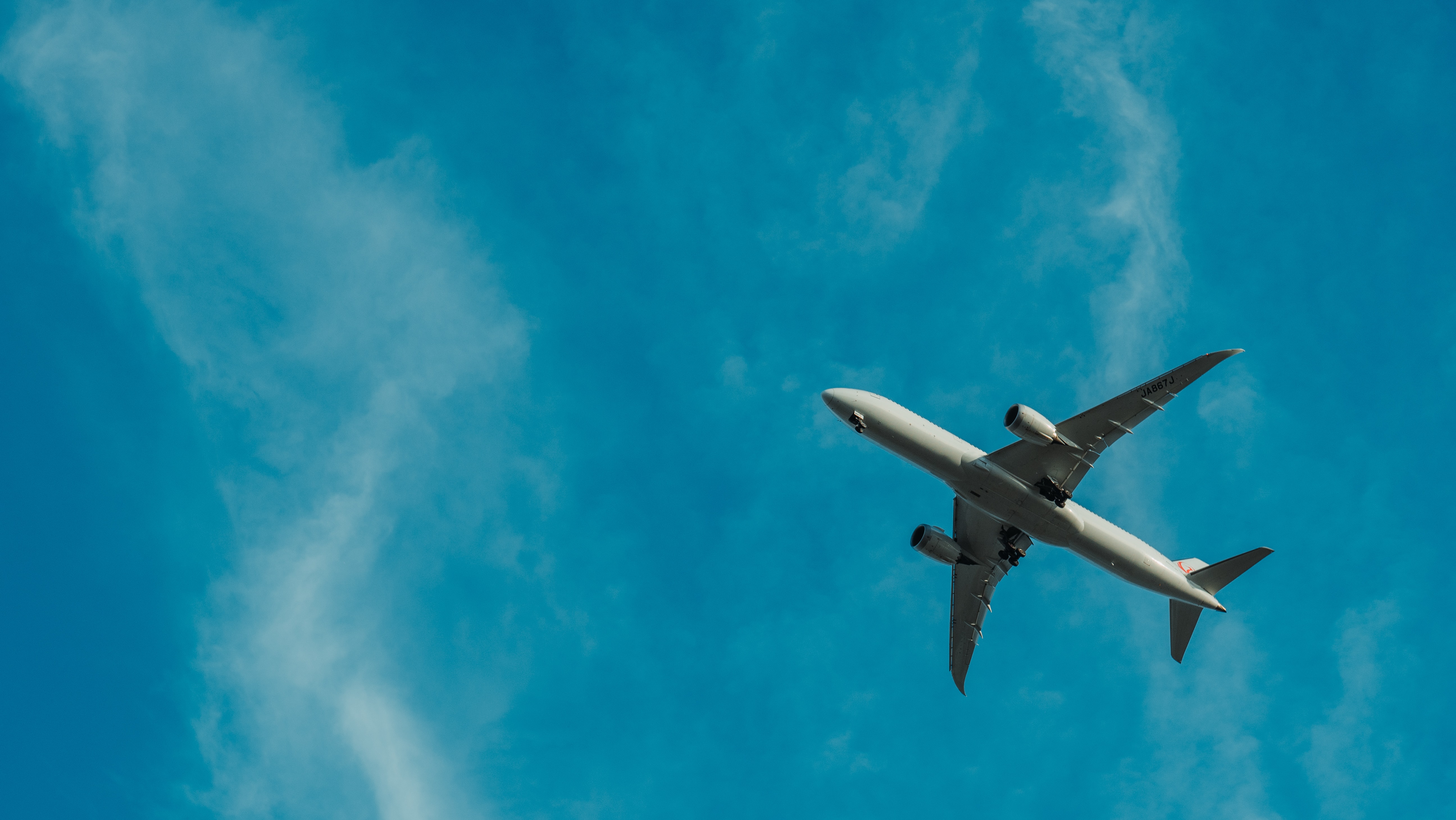 Airplane flying in the blue sky