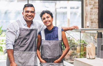 business owners in aprons