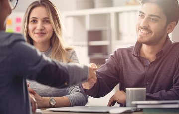 couple meeting with a foreclosure prevention advisor