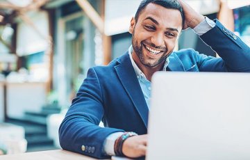 man looking at portfolio online